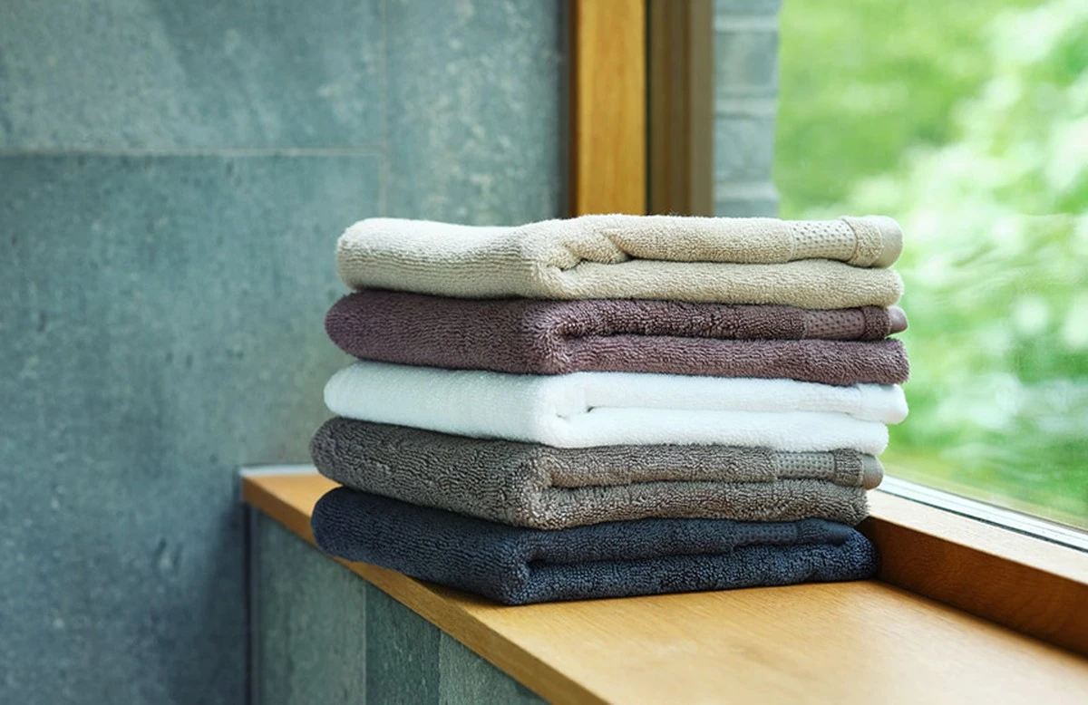 Jedna lahev z kuchyňské linky oživí vaše ručníky: Jak získat zpět jejich nadýchanost - image 2