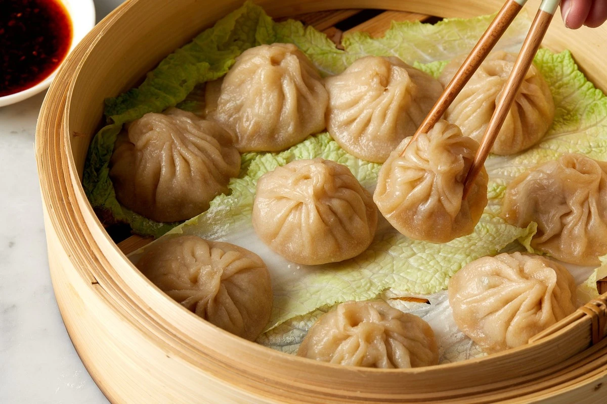 Tekutý poklad uvnitř: Proč zkušené hospodyňky přidávají sklenici vody do vařených knedlíčků - image 2